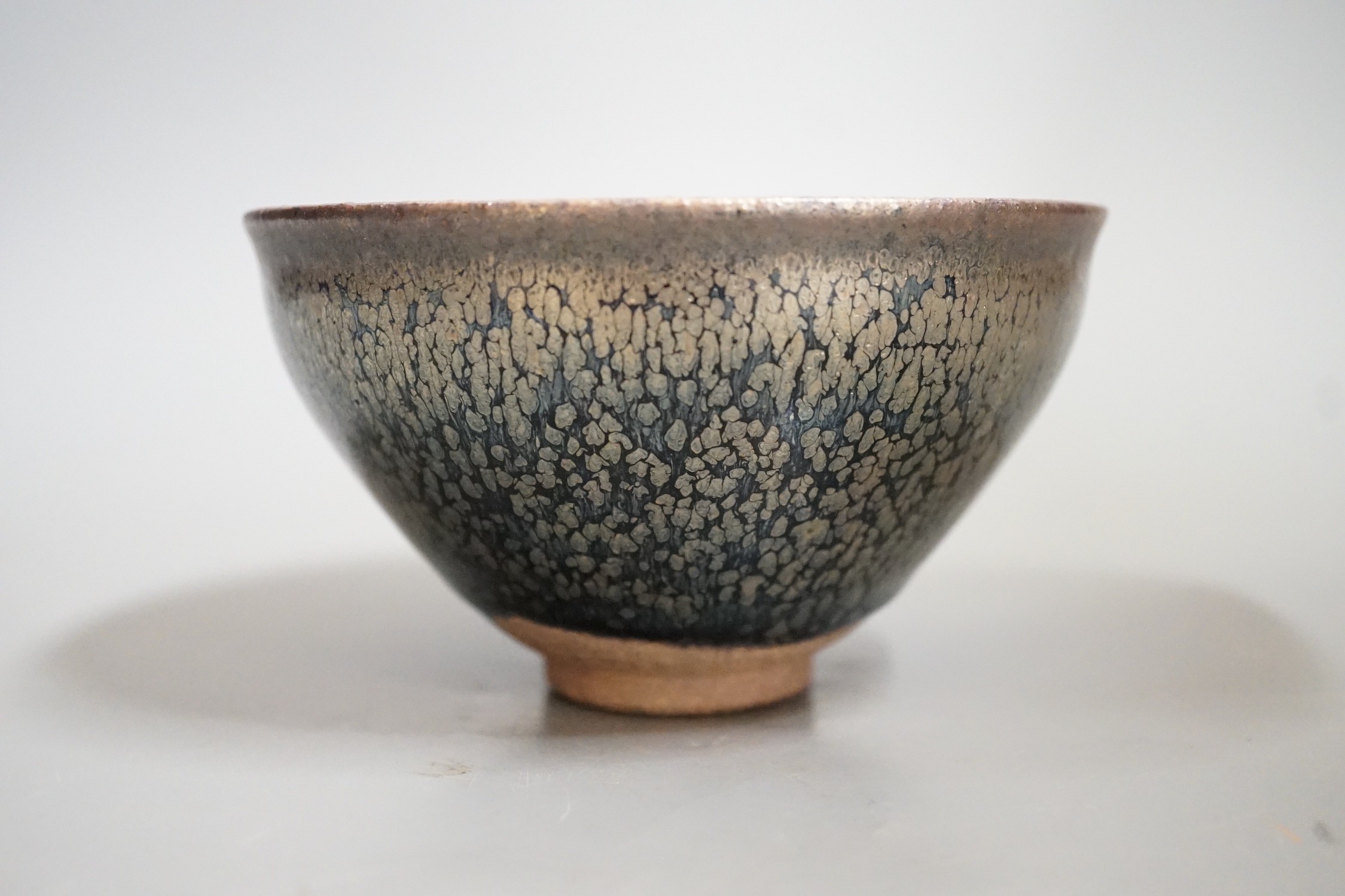 A Chinese Jian type silver hare's fur bowl, 7cms high